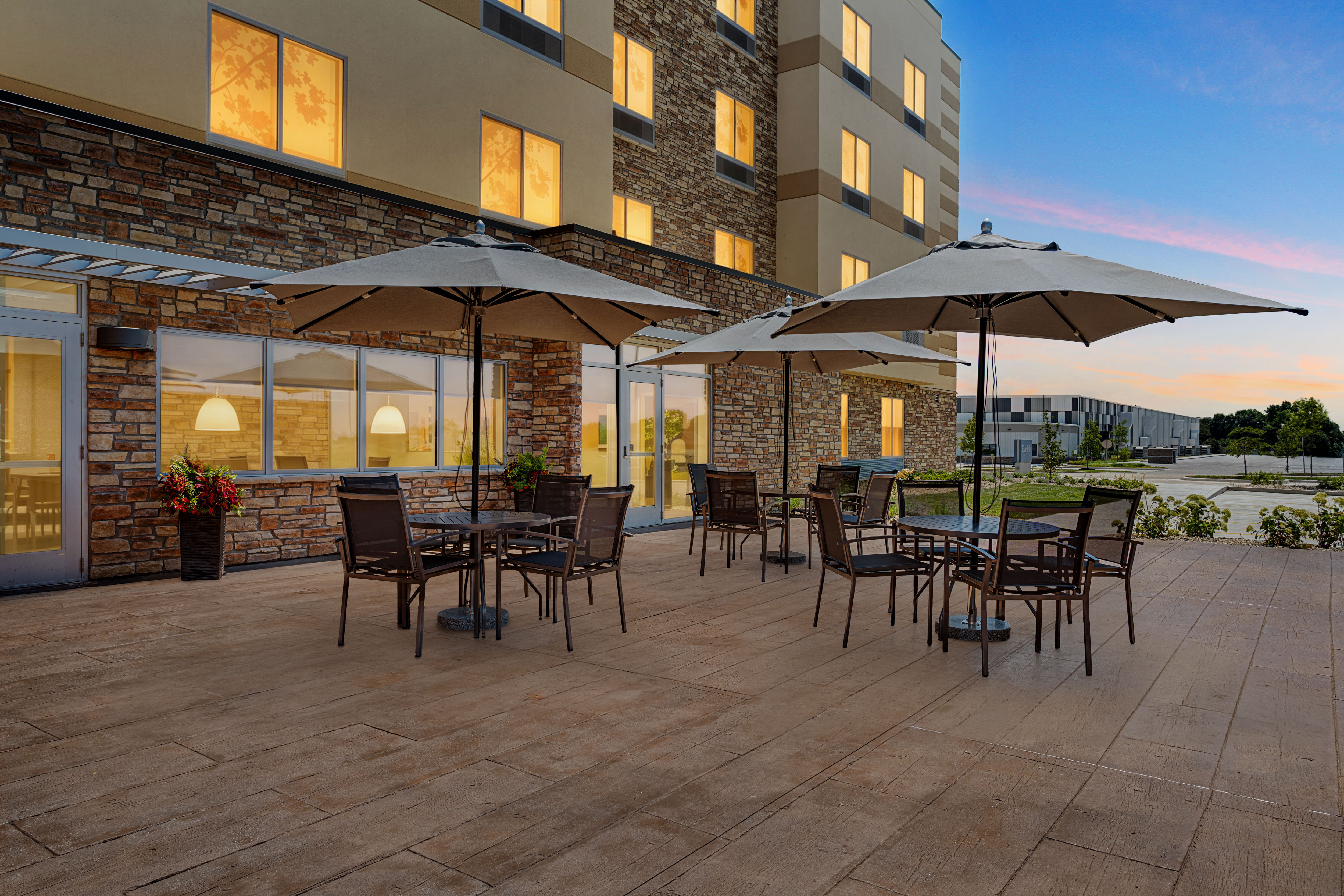 Exterior property photo after virtual twilight conversion with enhanced sky and lighting